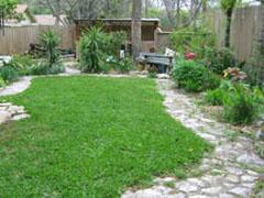 Relax on the covered patio in our English garden.
